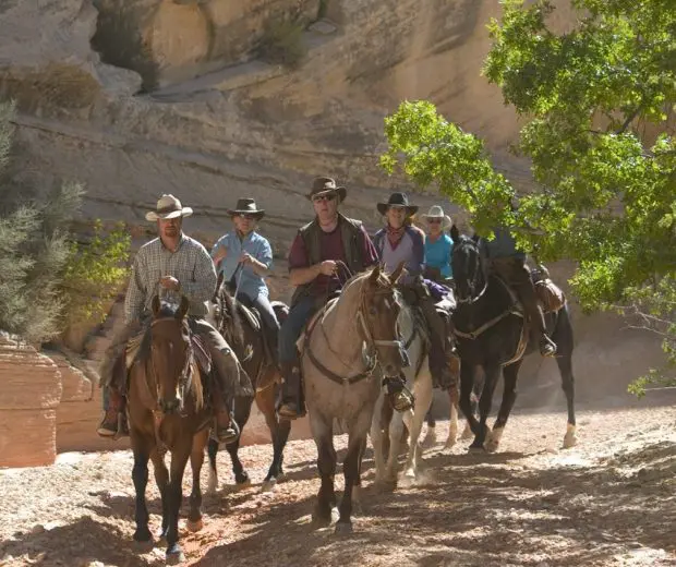 Ride through unique terrain on the Three Park Spectacular horseback riding vacation in Arizona and Utah