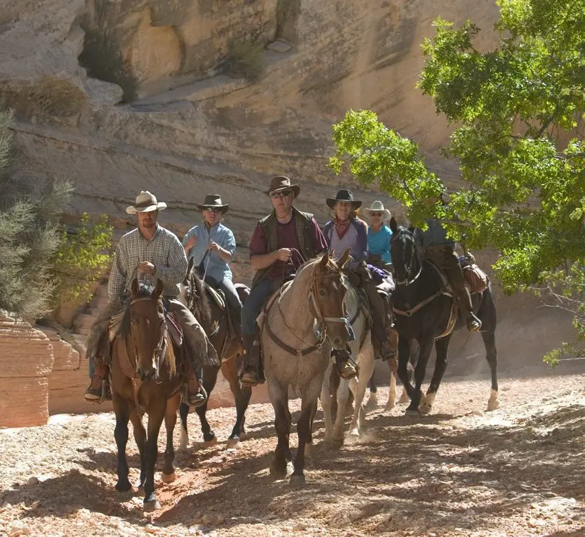 Ride through unique terrain on the Three Park Spectacular horseback riding vacation in Arizona and Utah