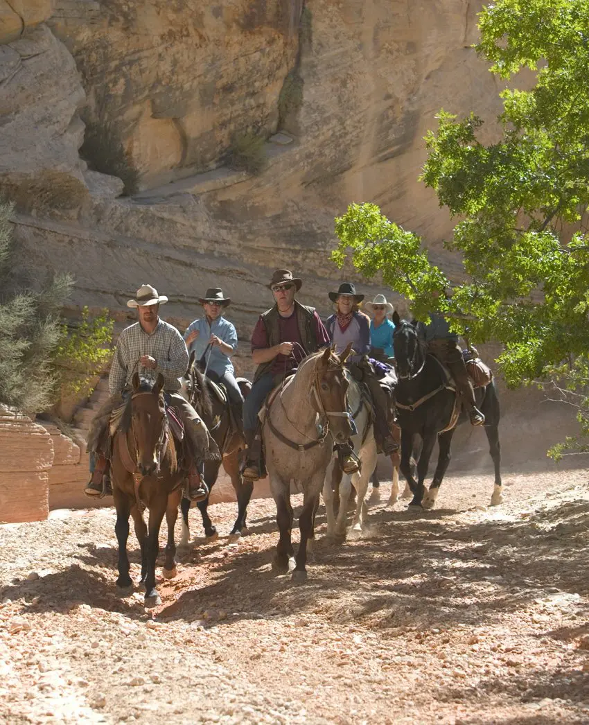 Ride through unique terrain on the Three Park Spectacular horseback riding vacation in Arizona and Utah