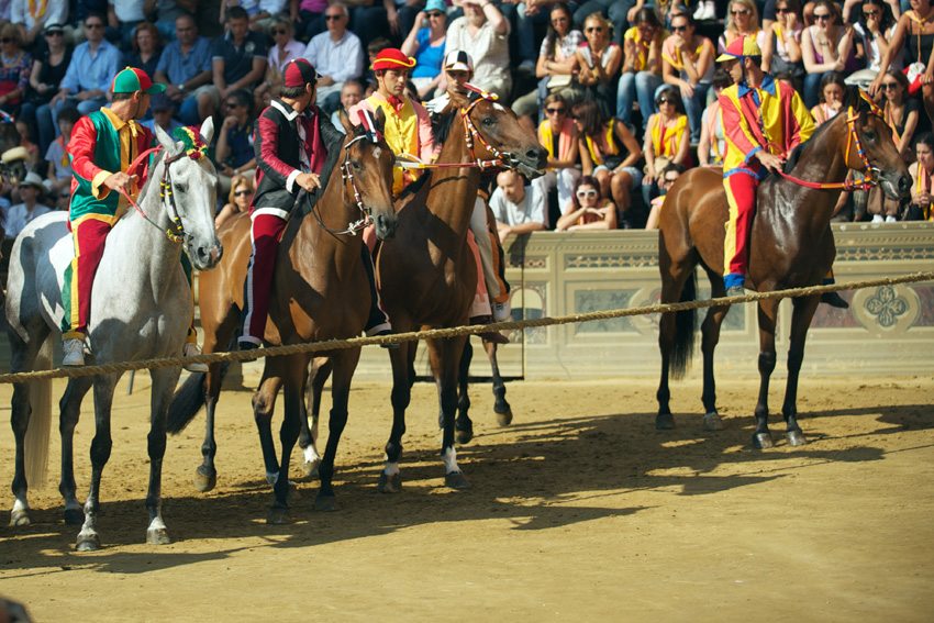 Feast of Conquerors-see the exciting Il Palio during your riding tour in Italy