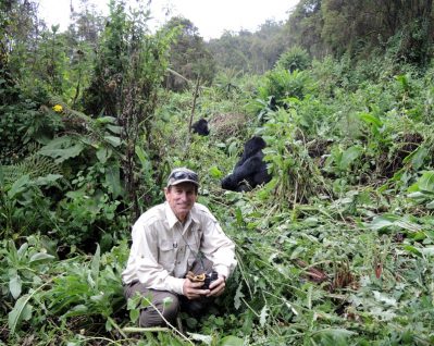 George Richardson, pictured here with gorilla in Rwanda